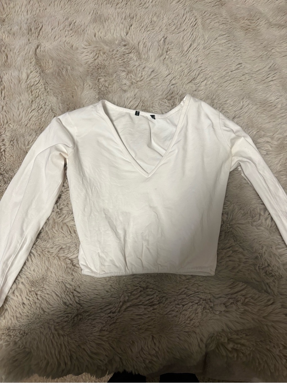White long sleeve top